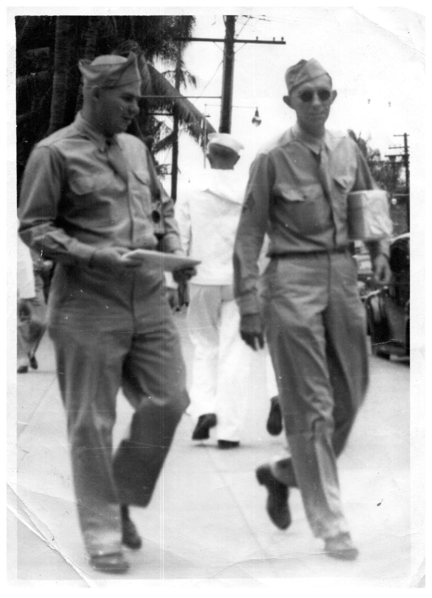 Frank walking down the street in Honolulu.